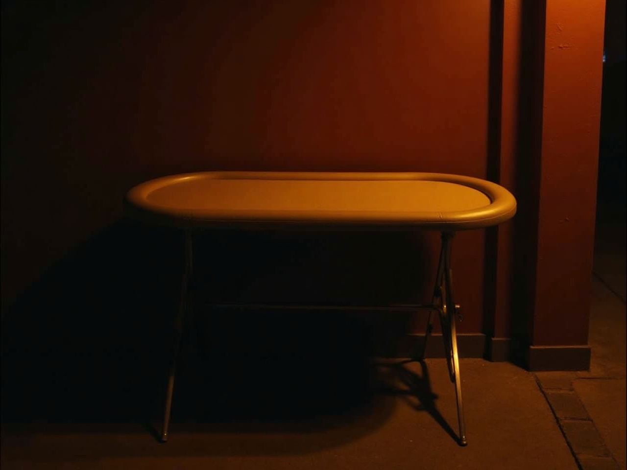 Fold-Away Club Table shown folded and set up